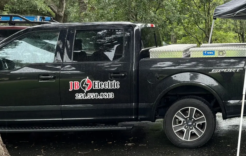 j.b. electric black work truck